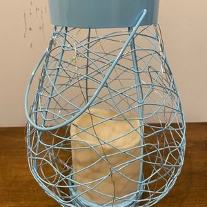 Hanging lantern with battery operated candle